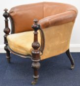 Victorian upholstered rosewood tub chair with turned and carved columns to the front legs and