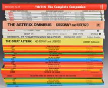 Collection of Tintin and Asterix books, comprising twenty-one books by Herge on The Adventures of