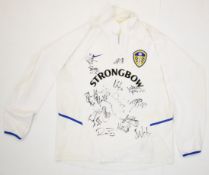 Leeds United F.C. multi-signed replica home shirt 2002 autographed by seventeen players