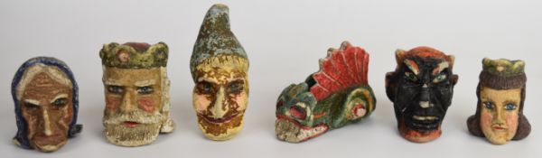 Six early twentieth century German composite Kasperle puppet heads comprising Kasper, King, Devil,