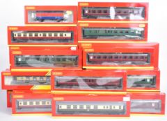 Twenty three Hornby 00 gauge model railway passenger carriages and goods wagons, in original boxes.