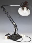 Herbert Terry black anglepoise lamp with stepped base, named verso, maximum height 96cm