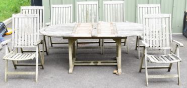 Teak extending oval garden table with slatted top and parasol hole, 206cm (extended), 74cm high,