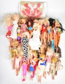 Thirty-five Barbie dolls by Mattel, the majority in original outfits, together with two Pippa