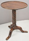 19thC mahogany circular tilt and tray top occasional table with moulded wrythen acanthus leaf