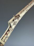 Turkish, Ottoman or Middle Eastern matchlock gun with embossed white metal decoration, amber and