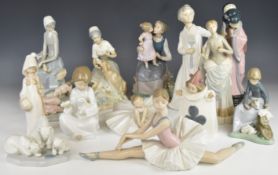 Fourteen Lladro / Nao figures including girl with pigs, playing card etc, tallest 26cm