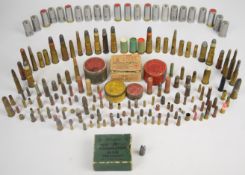 A collection of collector's shotgun and rifle cartridges and percussion caps including Kynoch