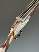 Silver Sabel De Luxe 12 bore sidelock side by side ejector shotgun with rose and scroll engraving to