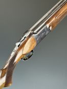 Miroku 800 12 bore over and under ejector shotgun with engraved action, chequered semi-pistol grip