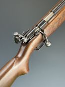 Remington .22 bolt-action target rifle with semi-pistol grip, fully adjustable Redfield peep hole