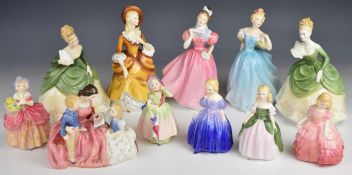 Eleven Royal Doulton figurines including Bedtime Story, Rose, Cissie, Enchantment etc, tallest 22cm