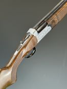 Midland 12 bore over and under ejector shotgun with engraved locks, underside, trigger guard, top