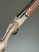 Winchester 101 XTR Lightweight 12 bore over and under ejector shotgun with engraved scenes of