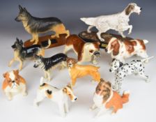 Eleven Beswick / Royal Doulton dog figures including matt Collie, Alsatian, Dalmatian, English