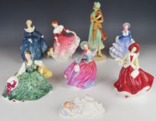 Eight Royal Doulton figurines including Harriet, Hannah and Autumn Breeze, tallest 28cm