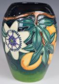 Moorcroft vase decorated in the Passion Flower pattern, dated 97 to base, H14cm