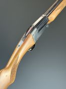 Unnamed 9mm folding single barrelled shotgun with chequered semi-pistol grip and forend and 26