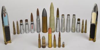 Twenty three inert collector's rifle and similar cartridges including two 30mm Aden sectioned rounds