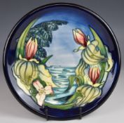 Moorcroft charger decorated in the Sweet Betsy pattern, dated 2000, diameter 22.5cm