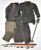 A collection of gun and shooting related items comprising a shooting stick, shotgun cartridge