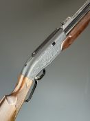 Shin Sung Career II 707 .22 underlever-action PCP FAC air rifle with scenes of dogs hunting wild