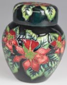 Moorcroft covered ginger jar decorated in the Poinsettia pattern, dated 2002, H11cm