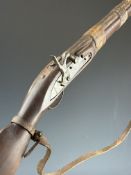Indian 8 bore percussion converted form flintlock gun with leather barrel bands, steel ram-rod,