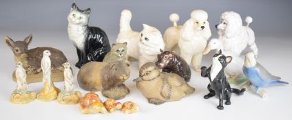 Fifteen Beswick / Royal Doulton, Poole and Copenhagen figures including meerkats, standard poodle
