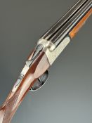 Gunmark Kestrel 20 bore side by side ejector shotgun with engraved scenes of birds to the locks