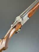 AYA Coral De Luxe 12 bore over and under ejector shotgun with heavily carved action featuring scenes