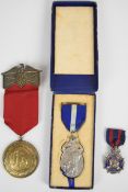 Badges and medals comprising Edward VII Society of Miniature Rifle Clubs hallmarked silver and