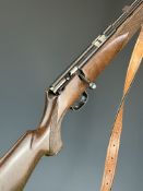 Voere .22 bolt-action rifle with chequered semi-pistol grip and forend, leather sling, multi-shot
