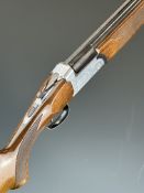 Midland 12 bore over and under ejector shotgun with engraved locks, underside, trigger guard, top