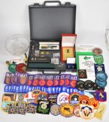 A collection of mainly Eley related items with over 70 embroidered patches including Bisley