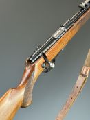 Walther .22 bolt-action rifle with chequered semi-pistol grip and forend, adjustable sights, leather