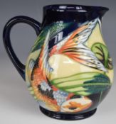 Moorcroft pedestal jug decorated with koi carp in the Quiet Waters pattern, dated 2002 to base,
