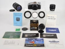 Olympus OM-30 35mm SLR camera, in original box with instructions and matching serial number, Olympus
