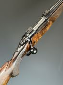 Winchester .223 bolt-action rifle with chequered semi-pistol grip and forend, sling mounts, scope