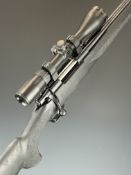 Howa Model 1500 .22-250 Remington bolt-action rifle with composite stock, textured semi-pistol