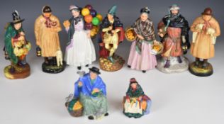 Nine Royal Doulton character figurines including Lambing Time, Pied Piper etc, tallest 26cm