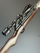 SMK Model XS79 .22 CO2 air rifle with semi-pistol grip, Simmons 3-9x40 scope and sound moderator,