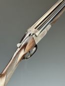 Belgian .410 side by side shotgun with locks, underside, thumb lever and fences, chequered grip