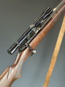 Winchester Model 320 .22 bolt-action rifle with chequered semi-pistol grip and forend, leather