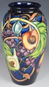 Moorcroft vase decorated in the Queen's Choice pattern, dated 2000 to base, H26cm