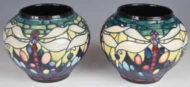 Pair of Moorcroft vases decorated with dragonflies in the Favrile pattern, dated 2000 to base,