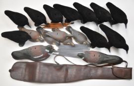 Twenty six shooting pigeon and crow decoys together with a faux leather shotgun or rifle slip and