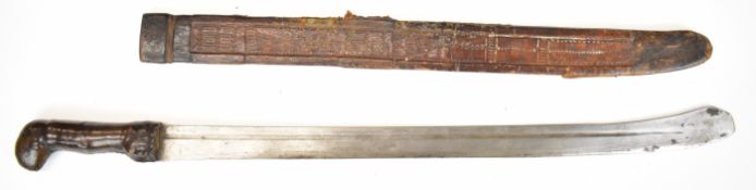 African tribal executioner's or similar sword with leather covered grip, 52cm blade and scabbard.