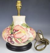 Moorcroft pedestal table lamp decorated in the Magnolia pattern, H27cm
