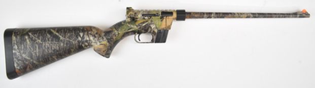 Henry US Survival .22 semi-automatic take down rifle breaking down to all store in the composite